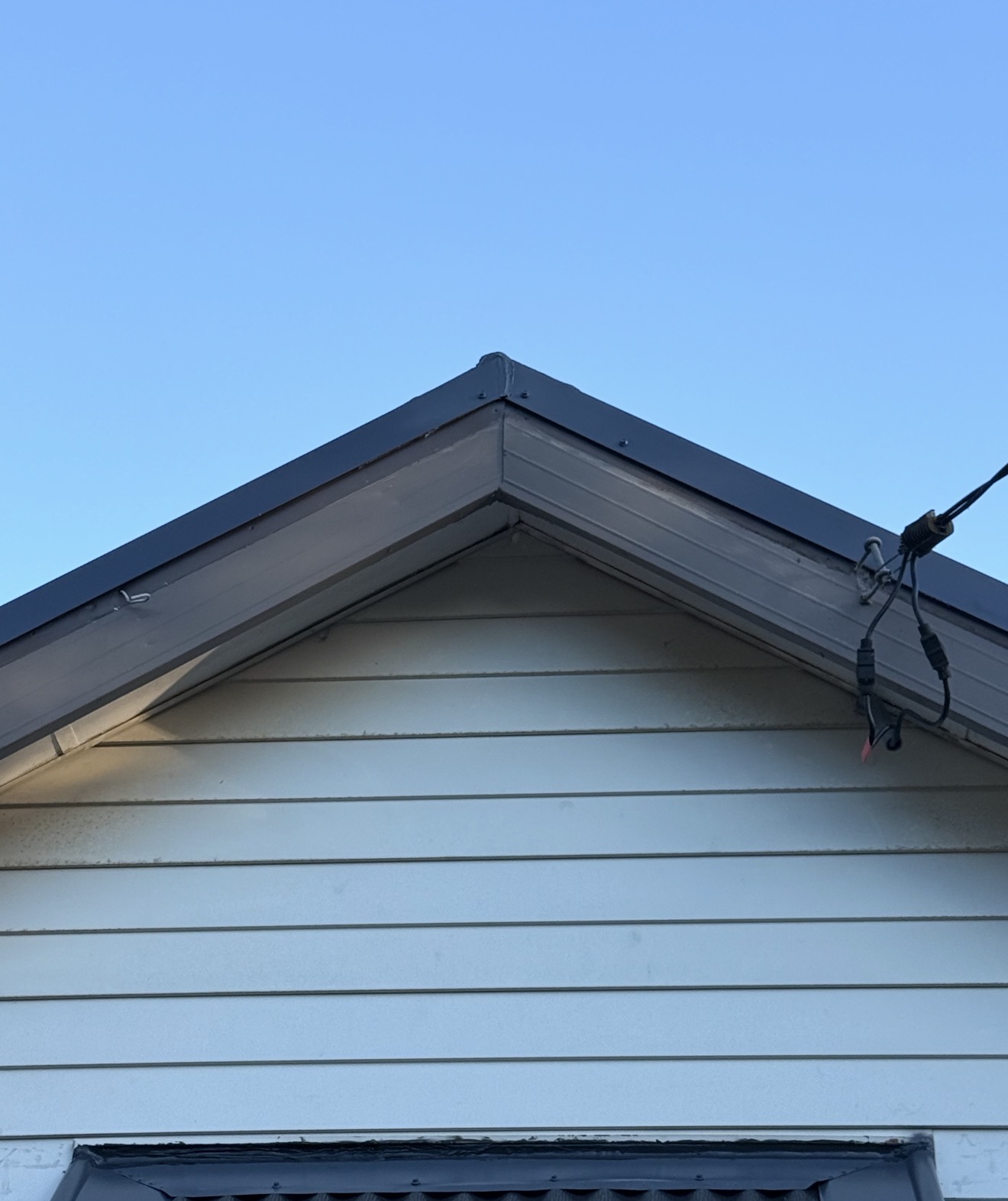 Completed Colorbond roof gable end — Croydon Park after decramastic tile replacement