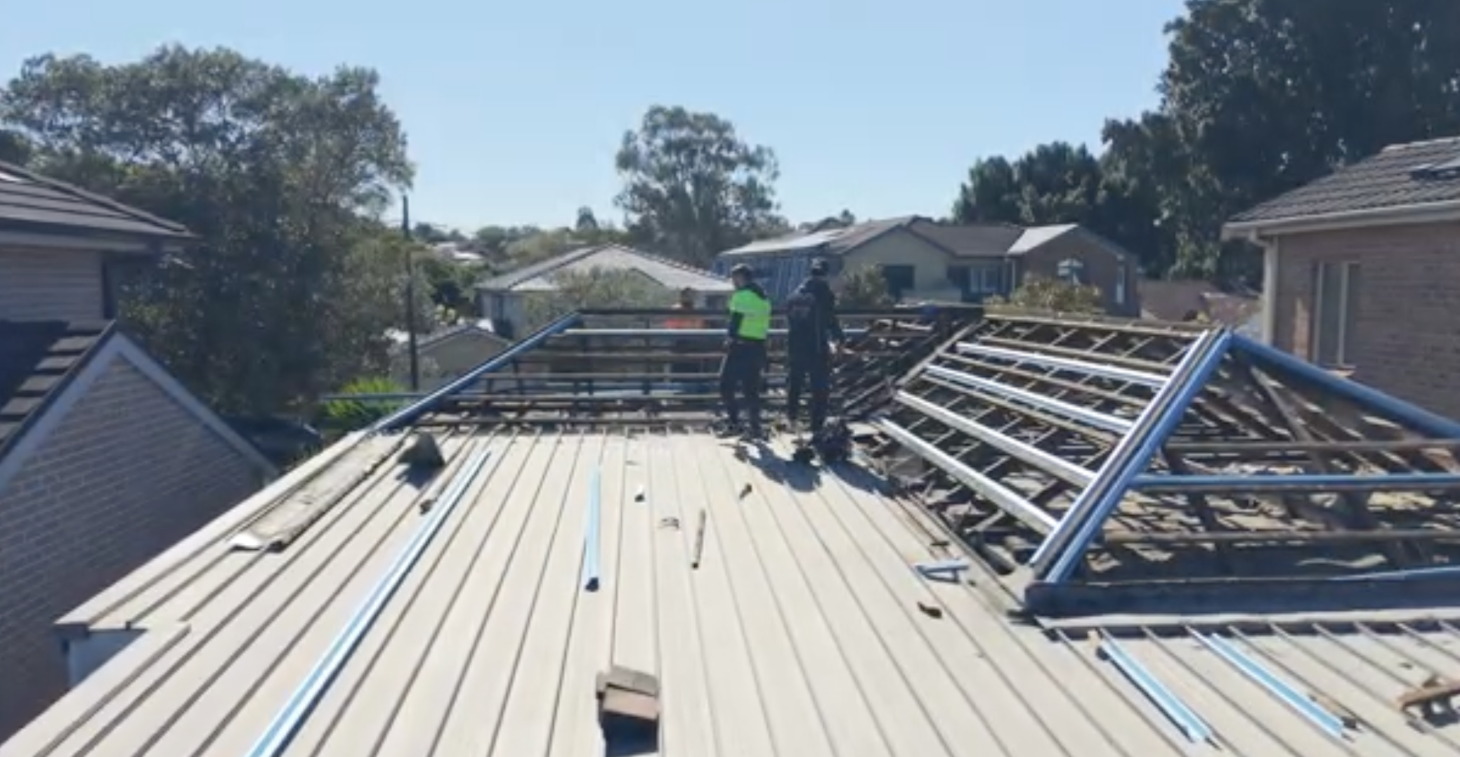 Roofing Goats crew installing new metal top hat battens after full asbestos removal — Croydon Park