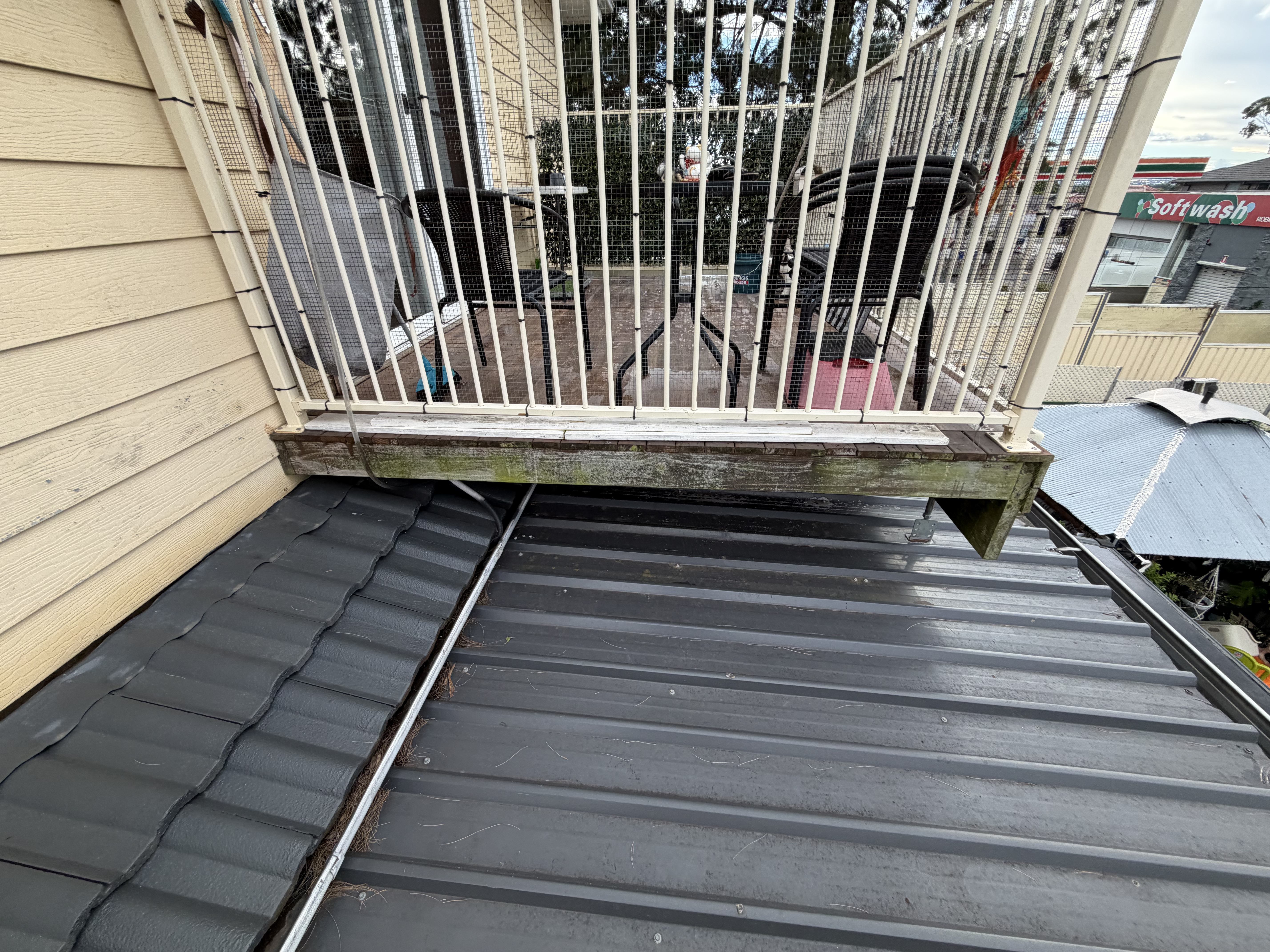 Existing roof alongside the balcony before Kliplok replacement — Mount Pritchard