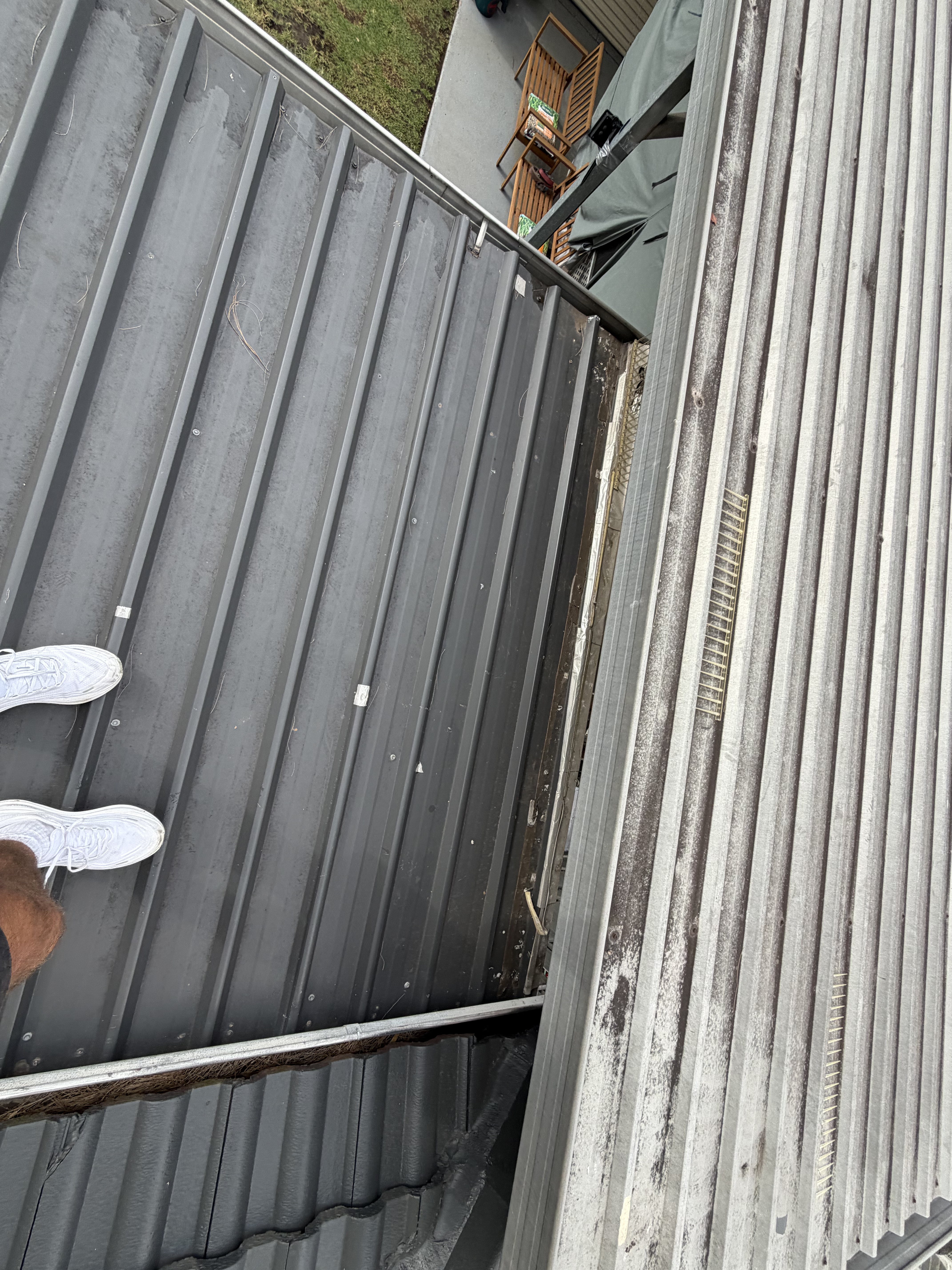 Old roof condition — two sections visible before replacement, Mount Pritchard