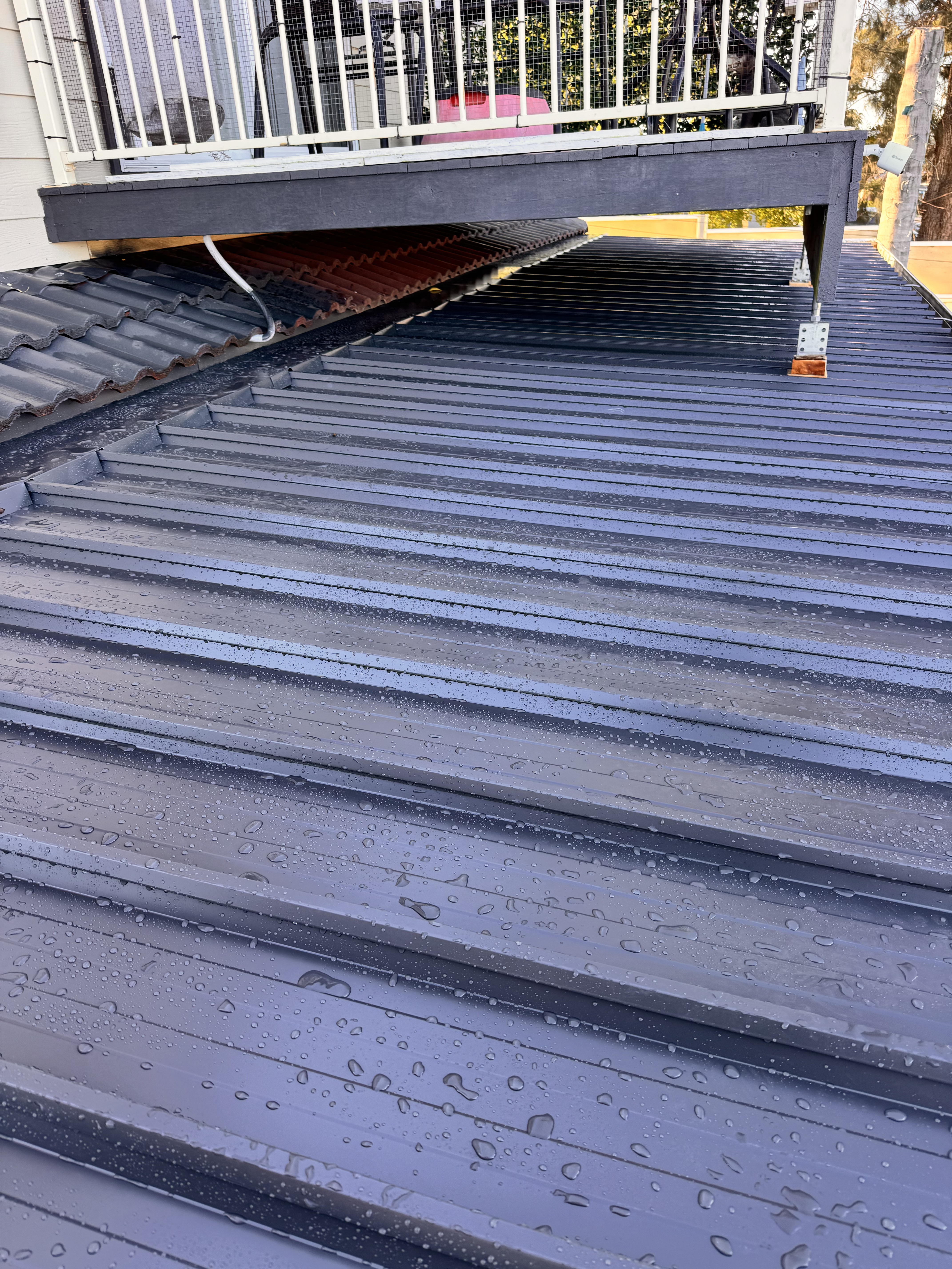 Colorbond Kliplok installed under balcony using ceiling joists — completed and watertight