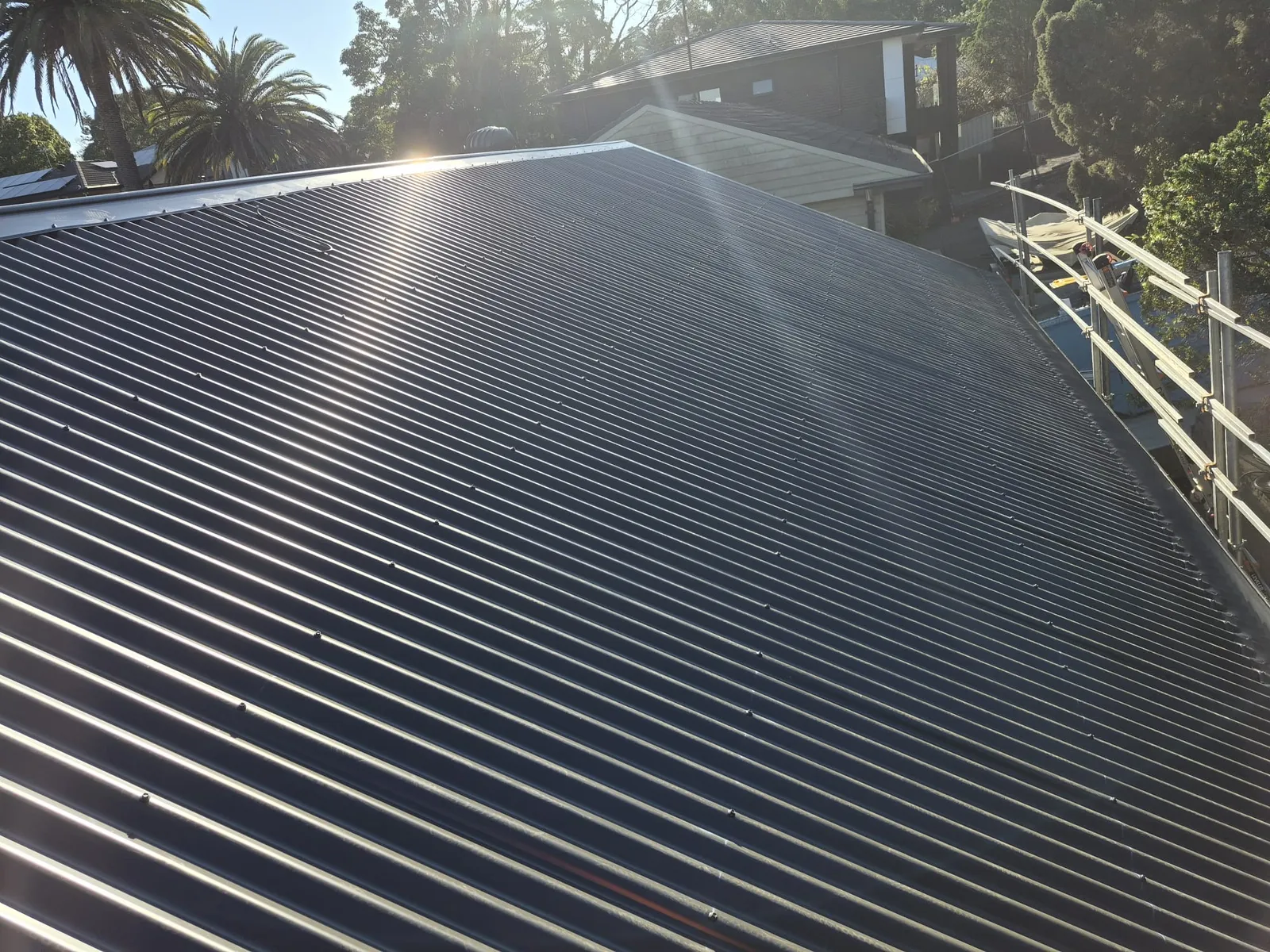 Finished corrugated metal roof plane at Eagle Street, Ryde after the roof replacement