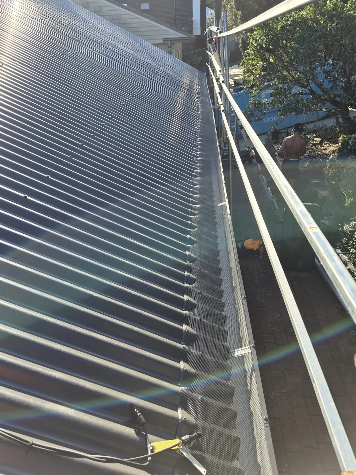 Completed metal roof edge and gutter line at Eagle Street, Ryde after replacement